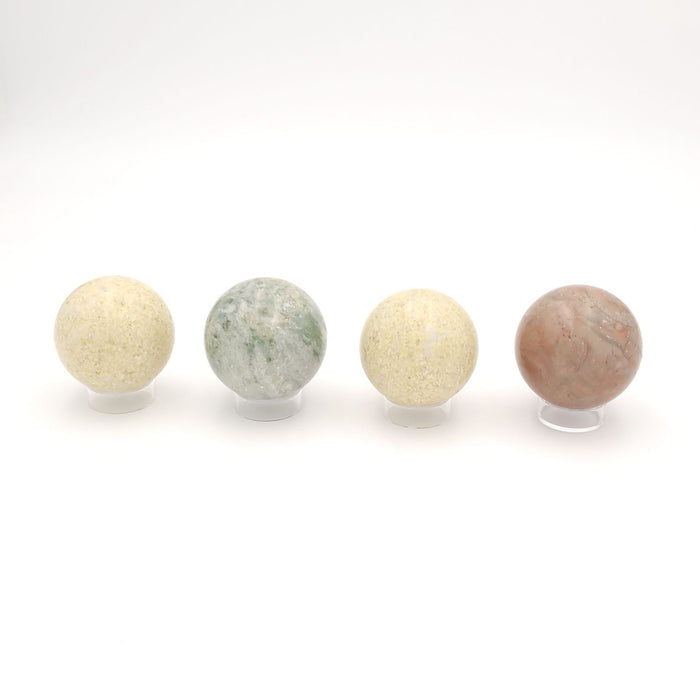 Collection of Four Specimen Polished Spheres in Various Stones, circa 1950