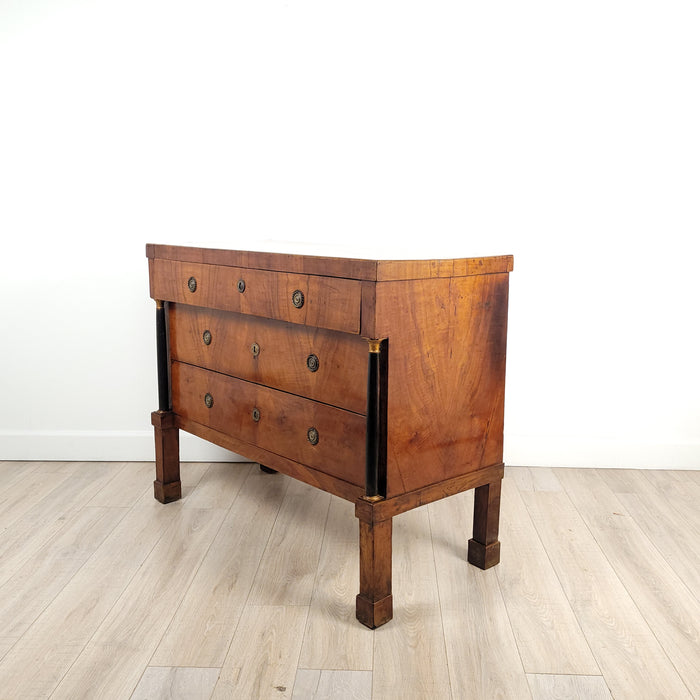 Provincial Walnut Neoclassical Commode with ebonized columns with elegant tall legs. Northern Italy circa 1810